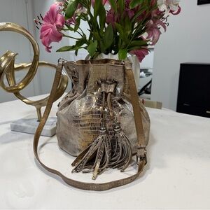 Chez by Cheryl Metallic Embossed Leather Tassel Bucket Bag